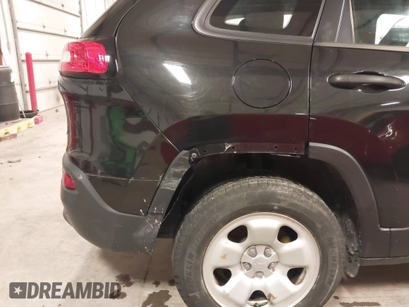 2016 Jeep Cherokee Sport with VIN 1C4PJMAB0GW321370, listed as a IAAI auction lot 41487094 with 131,336 mi miles and . Bid and sale history available at DreamBid. Image 18.