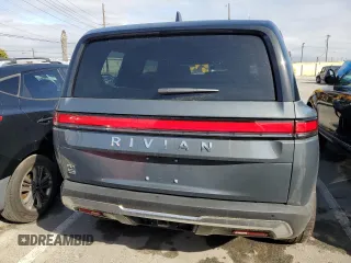 2025 Rivian R1S Adventure z VIN 7PDSGBBA5SN048839, wystawiony jako Copart lot #89199375 z przebiegiem 5177 mil mil oraz Szkody całkowita. Historia ofert i sprzedaży dostępna na DreamBid. Obrazek 6.