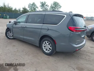 2022 Chrysler Pacifica Touring L with VIN 2C4RC1BG9NR142830, listed as a IAAI auction lot 42412136 with 104,964 mi miles and . Bid and sale history available at DreamBid. Image 3.