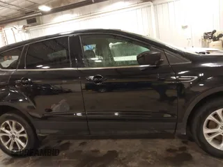 2017 Ford Escape SE with VIN 1FMCU9G94HUE08060, listed as a IAAI auction lot 41856229 with 187,838 mi miles and . Bid and sale history available at carsss.com. Image 14.
