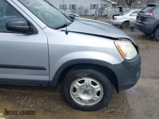 2005 Honda CR-V LX with VIN JHLRD78535C042479, listed as a IAAI auction lot 41682963 with 216,777 mi miles. Bid and sale history available at carsss.com. Image 19.