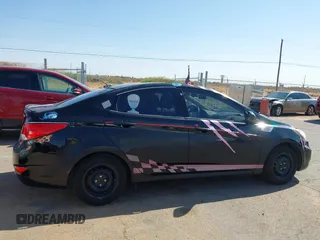 2014 Hyundai Accent GLS with VIN KMHCT4AE2EU749061, listed as a IAAI auction lot 42017566 with 93,929 mi miles. Bid and sale history available at carsss.com. Image 13.