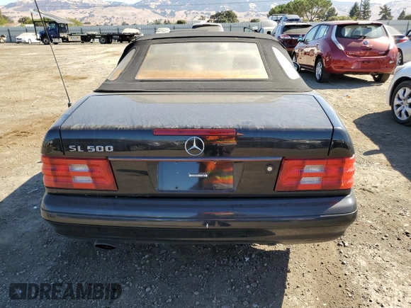 1999 Mercedes-Benz SL-Class with VIN WDBFA68F8XF186072, listed as a Copart auction lot 69557094 with 99,691 mi miles and Salvage Title. Bid and sale history available at carsss.com. Image 6.