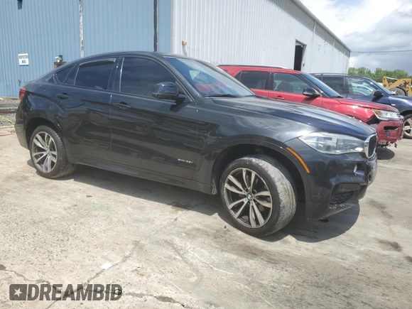 2015 BMW X6 xDrive35i z VIN 5UXKU2C58F0N77513, wystawiony jako Copart lot #55859345 z przebiegiem 82 560 mil mil oraz Szkoda całkowita • Salvage title. Historia ofert i sprzedaży dostępna na DreamBid. Obrazek 4.