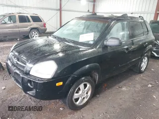 2005 Hyundai Tucson GL with VIN KM8JM12B75U072080, listed as a IAAI auction lot 41779464 with 191,771 mi miles. Bid and sale history available at carsss.com. Image 17.