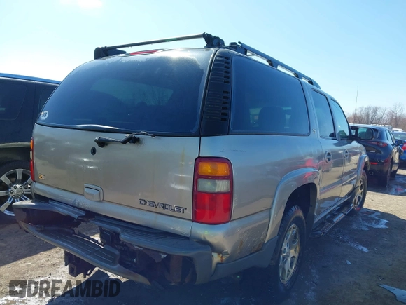 2003 Chevrolet Suburban Z71 with VIN 3GNFK16Z33G253479, listed as a IAAI auction lot 41871504 with 157,990 mi miles and . Bid and sale history available at DreamBid. Image 4.