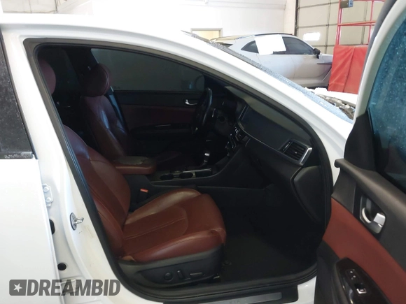 2016 Kia Optima SX Turbo with VIN 5XXGW4L23GG016526, listed as a IAAI auction lot 41428139 with 112,603 mi miles and . Bid and sale history available at carsss.com. Image 5.