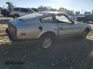 1983 Datsun 280ZX z VIN JN1HZ04S6DX571982, wystawiony jako Copart lot #86317294 z przebiegiem Nie podano mil oraz Tytuł czysty. Historia ofert i sprzedaży dostępna na DreamBid. Obrazek 3.