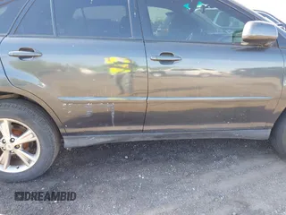 2006 Lexus RX 400h with VIN JTJHW31UX62000621, listed as a IAAI auction lot 42153940 with 196,848 mi miles and . Bid and sale history available at DreamBid. Image 13.