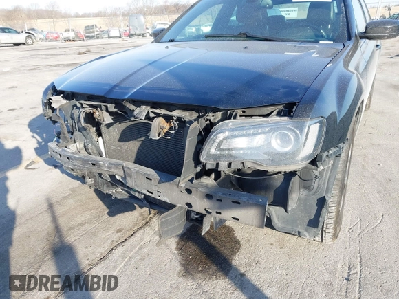 2015 Chrysler 300 with VIN 2C3CCAGG8FH808618, listed as a IAAI auction lot 41695711 with 137,050 mi miles. Bid and sale history available at carsss.com. Image 6.