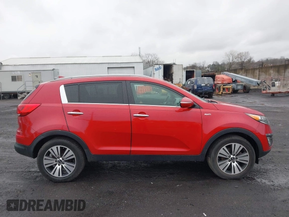 2014 Kia Sportage EX with VIN KNDPCCAC9E7552904, listed as a IAAI auction lot 41980439 with 184,871 mi miles and . Bid and sale history available at DreamBid. Image 13.