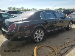 2007 Bentley Flying Spur с VIN SCBBR93WX7C047888, выставлен на аукционе Copart как лот 55321705 с пробегом 68 774 миль миль и Списание • Salvage title. История ставок и продаж доступна на DreamBid. Изображение 3.