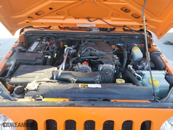 2012 Jeep Wrangler Unlimited Sport with VIN 1C4BJWDG4CL273736, listed as a Copart auction lot 47252685 with 100,035 mi miles and Clean Title. Bid and sale history available at carsss.com. Image 11.