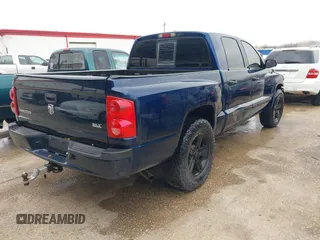 2007 Dodge Dakota SLT with VIN 1D7HE48K07S137252, listed as a IAAI auction lot 41385640 with 223,920 mi miles and . Bid and sale history available at carsss.com. Image 4.