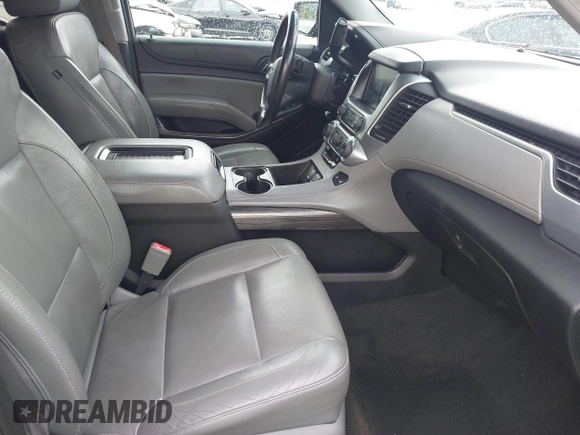 2016 Chevrolet Suburban LT z VIN 1GNSCHKCXGR111027, wystawiony jako IAAI lot #42399887 z przebiegiem 133 970 mil mil oraz . Historia ofert i sprzedaży dostępna na DreamBid. Obrazek 5.