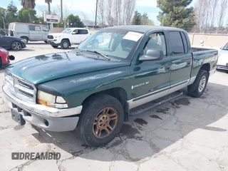 2001 Dodge Dakota Sport with VIN 1B7HL2AN81S281275, listed as a IAAI auction lot 41693105 with 276,182 mi miles. Bid and sale history available at carsss.com. Image 2.