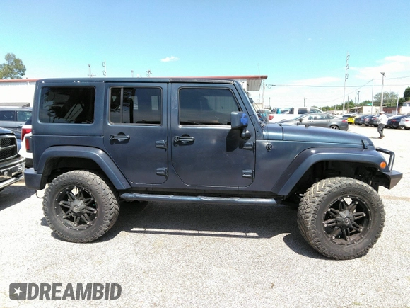 2013 Jeep Wrangler Unlimited Sport z VIN 1C4BJWDG1DL660844, wystawiony jako IAAI lot #42347284 z przebiegiem 168 709 mil mil oraz . Historia ofert i sprzedaży dostępna na DreamBid. Obrazek 13.