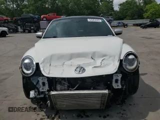 2017 Volkswagen Beetle Dune с VIN 3VWS17AT4HM628723, выставлен на аукционе Copart как лот 54303445 с пробегом 138 254 миль миль и Списание • Salvage title. История ставок и продаж доступна на DreamBid. Изображение 5.