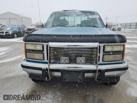 1992 GMC Sierra 2500 z VIN 2GTFK29K3N1539843, wystawiony jako Copart lot #45037335 z przebiegiem 146 355 mil mil oraz Szkody całkowita. Historia ofert i sprzedaży dostępna na DreamBid. Obrazek 5.
