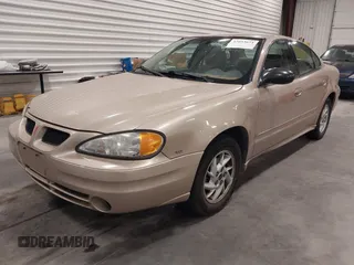 2003 Pontiac Grand Am SE1 with VIN 1G2NF52EX3C104710, listed as a IAAI auction lot 42053621 with 102,012 mi miles. Bid and sale history available at carsss.com. Image 2.