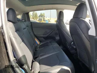 2024 Tesla Model Y Long Range with VIN 7SAYGDEE6RA219456, listed as a Copart auction lot 61855165 with 29,869 mi miles and Salvage title. Bid and sale history available at DreamBid. Image 10.