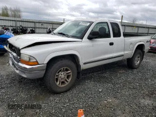 2004 Dodge Dakota SLT with VIN 1D7HG42N14S628373, listed as a Copart auction lot 52440565 with 137,869 mi miles and Salvage Title. Bid and sale history available at carsss.com. Image 1.