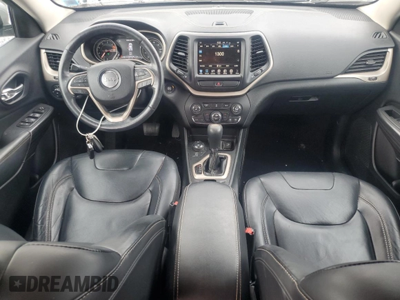 2016 Jeep Cherokee Limited with VIN 1C4PJMDB8GW248874, listed as a Copart auction lot 63388455 with 132,535 mi miles and Salvage title. Bid and sale history available at DreamBid. Image 8.