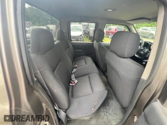 2004 Nissan Frontier SC z VIN 1N6MD29Y24C441110, wystawiony jako Copart lot #75842344 z przebiegiem 119 954 mil mil oraz Czysty tytuł • Clean title. Historia ofert i sprzedaży dostępna na DreamBid. Obrazek 6.