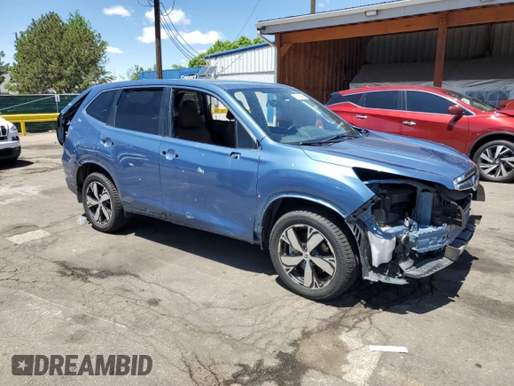 2020 Subaru Forester Touring with VIN JF2SKAXC9LH452951, listed as a Copart auction lot 56428495 with 12,390 mi miles and Salvage title. Bid and sale history available at DreamBid. Image 4.