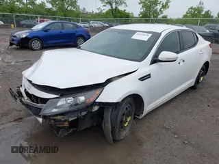 2011 Kia Optima LX z VIN KNAGM4A72B5092737, wystawiony jako IAAI lot #42321978 z przebiegiem 183 742 mil mil oraz . Historia ofert i sprzedaży dostępna na DreamBid. Obrazek 2.