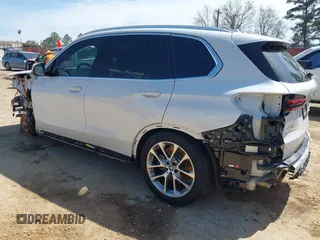 2024 BMW X5 xDrive50e with VIN 5UX43EU05R9T41661, listed as a IAAI auction lot 41819833 with 24,407 mi miles. Bid and sale history available at carsss.com. Image 3.