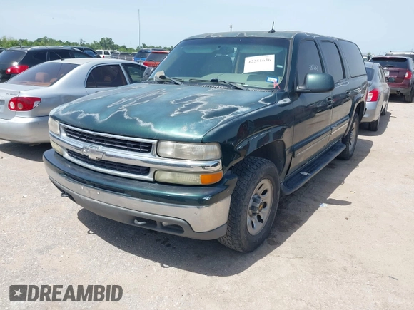 2002 Chevrolet Suburban LT with VIN 1GNEC16Z52J330522, listed as a IAAI auction lot 42251636 with 292,936 mi miles and . Bid and sale history available at DreamBid. Image 2.