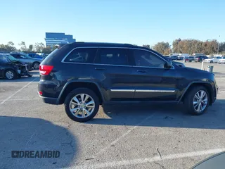 2013 Jeep Grand Cherokee Laredo with VIN 1C4RJEAG2DC643290, listed as a IAAI auction lot 41751696 with 125,258 mi miles. Bid and sale history available at carsss.com. Image 13.