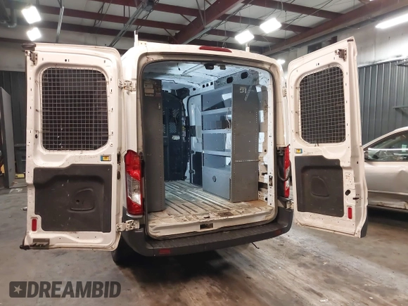 2016 Ford Transit Cargo with VIN 1FTYR1CM2GKA12288, listed as a IAAI auction lot 41752611 with 238,715 mi miles and . Bid and sale history available at DreamBid. Image 3.