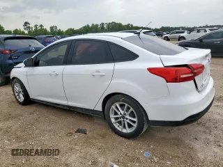 2016 Ford Focus SE with VIN 1FADP3F29GL259317, listed as a Copart auction lot 62646685 with 100,523 mi miles and Salvage title. Bid and sale history available at DreamBid. Image 2.