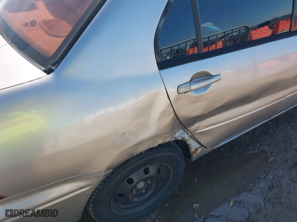 2002 Mitsubishi Lancer ES with VIN JA3AJ26E82U076009, listed as a IAAI auction lot 41671572 with 172,236 mi miles. Bid and sale history available at carsss.com. Image 6.