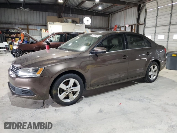 2014 Volkswagen Jetta TDI w/Premium/Nav with VIN 3VWLL7AJ3EM352687, listed as a Copart auction lot 63249725 with 122,678 mi miles and Clean title. Bid and sale history available at DreamBid. Image 1.
