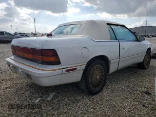 1994 Chrysler LeBaron z VIN 1C3EU4530RF259672, wystawiony jako Copart lot #80346444 z przebiegiem Nie podano mil oraz Szkody całkowita. Historia ofert i sprzedaży dostępna na DreamBid. Obrazek 3.