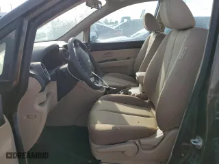 2009 Kia Rondo LX Base with VIN KNAFG528397257483, listed as a Copart auction lot 73800174 with 0 mi miles and Salvage Title. Bid and sale history available at carsss.com. Image 7.
