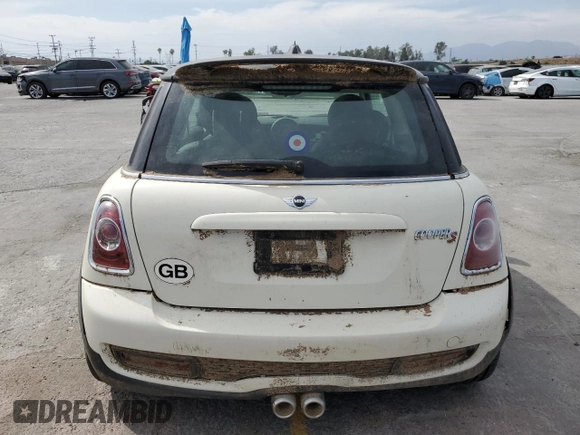 2013 MINI Hardtop S with VIN WMWSV3C51DT394368, listed as a Copart auction lot 57654475 with 86,136 mi miles and Clean Title. Bid and sale history available at DreamBid. Image 6.