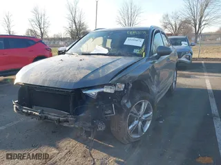 2021 Audi Q3 S line Premium with VIN WA1DECF37M1075942, listed as a IAAI auction lot 41192874 with 50,670 mi miles. Bid and sale history available at carsss.com. Image 2.
