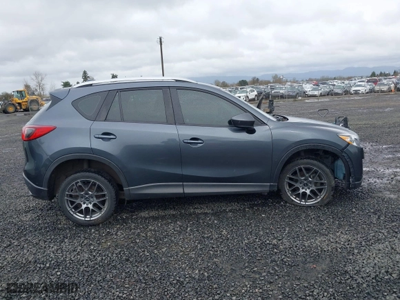 2013 Mazda CX-5 Sport with VIN JM3KE2BE7D0154040, listed as a IAAI auction lot 41842013 with 132,382 mi miles. Bid and sale history available at carsss.com. Image 13.