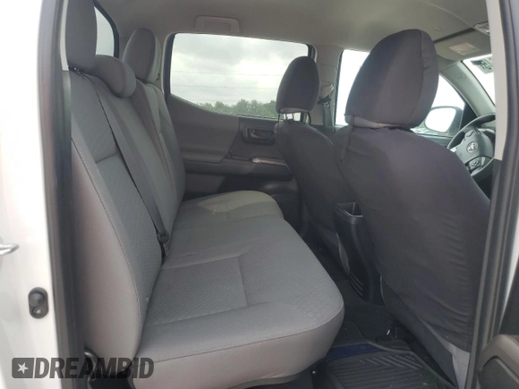 2023 Toyota Tacoma SR5 z VIN 3TMAZ5CN2PM209813, wystawiony jako Copart lot #53946645 z przebiegiem 23 411 mil mil oraz Szkody całkowita. Historia ofert i sprzedaży dostępna na DreamBid. Obrazek 10.