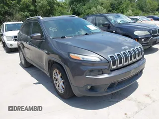 2016 Jeep Cherokee Latitude with VIN 1C4PJLCBXGW265431, listed as a IAAI auction lot 42542328 with 127,249 mi miles and . Bid and sale history available at DreamBid. Image 1.