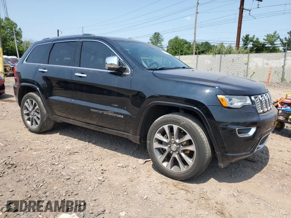 2017 Jeep Grand Cherokee Overland with VIN 1C4RJFCG9HC684850, listed as a Copart auction lot 62746974 with 0 mi miles and Salvage Title. Bid and sale history available at carsss.com. Image 4.