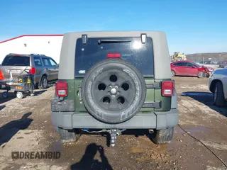 2008 Jeep Wrangler Unlimited X with VIN 1J8GA39118L594626, listed as a IAAI auction lot 41618878 with 166,071 mi miles and . Bid and sale history available at DreamBid. Image 16.