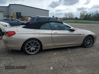 2012 BMW 6 Series 650i z VIN WBALZ3C52CC397545, wystawiony jako Copart lot #55976625 z przebiegiem 147 352 mil mil oraz Tytuł czysty. Historia ofert i sprzedaży dostępna na DreamBid. Obrazek 3.