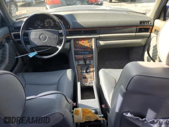 1990 Mercedes-Benz 560 with VIN WDBCA39EXLA503543, listed as a Copart auction lot 65978444 with 195,635 mi miles and Clean Title. Bid and sale history available at DreamBid. Image 8.
