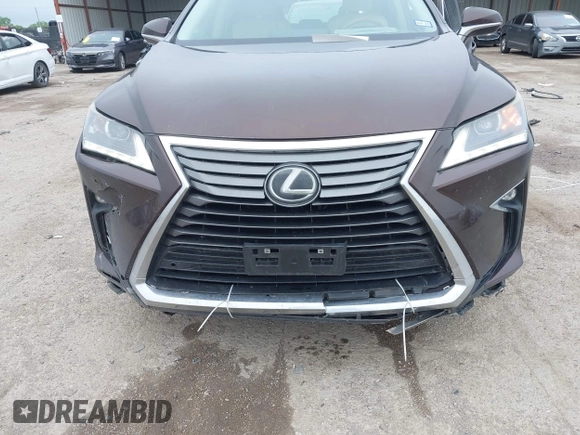 2016 Lexus RX 350 z VIN 2T2ZZMCA5GC029529, wystawiony jako IAAI lot #41953567 z przebiegiem 133 460 mil mil oraz . Historia ofert i sprzedaży dostępna na DreamBid. Obrazek 6.