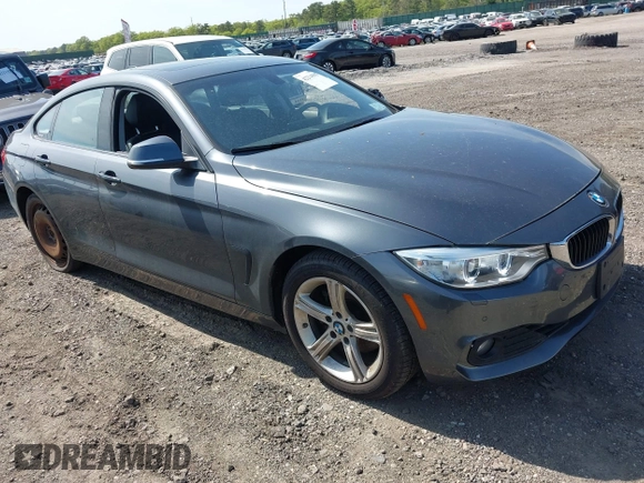 2015 BMW 4 Series 428i xDrive with VIN WBA4C9C55FD331921, listed as a IAAI auction lot 42214901 with 94,970 mi miles and . Bid and sale history available at DreamBid. Image 1.